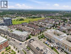 Aerial perspective showcasing a diverse urban landscape with residential and commercial properties - 