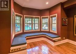 Billiards room with seating and pool view - 