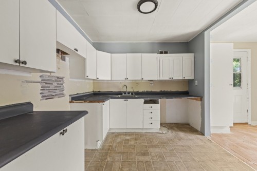 Cuisine - 100 Av. Des Tourterelles, Pontiac, QC - Indoor Photo Showing Kitchen With Double Sink