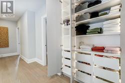 Built in Linen w/Custom LED lighting in Hall. - 