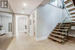 Glass railings continue downstairs - 