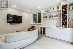Rec Room w/Feature Bar and built in fridge. - 
