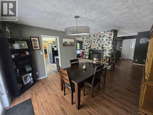 3219 Hayman Crescent, Quesnel, BC - Indoor Photo Showing Dining Room With Fireplace