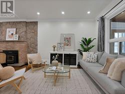 32 ROSEVEAR AVENUE Toronto, ON M4C 1Z3