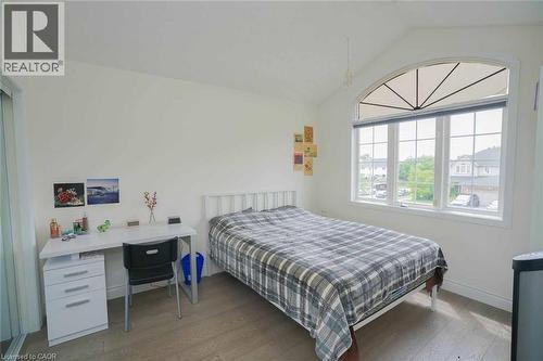 Vaulted ceiling room featuring wood-finish flooring - 187 Adler Drive, Cambridge, ON - Indoor Photo Showing Bedroom