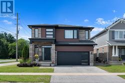 Double driveway & garage. - 