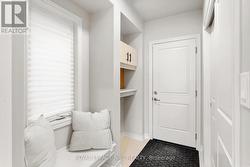 Mudroom with door to garage - 
