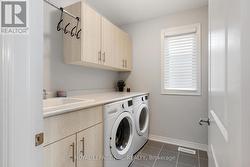 2nd floor laundry w/ cabinetys - 