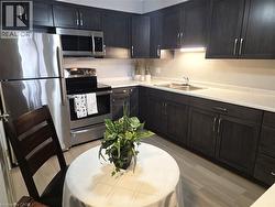 New kitchen, with new floors, lights, sink, under counter lighting - 