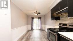 Upper - Eat in kitchen with patio doors to deck - 