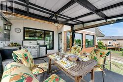 Deck off Kitchen with outdoor cooking centre. - 