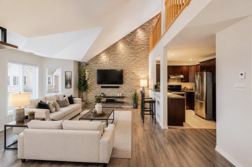 Overall view - 1564 Boul. Du Millénaire, Saint-Basile-Le-Grand, QC - Indoor Photo Showing Living Room With Fireplace