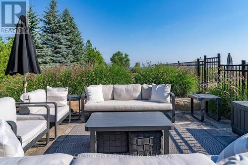 Patio sitting area for lounging after a busy day - 176 Bartlett Boulevard, Collingwood, ON 