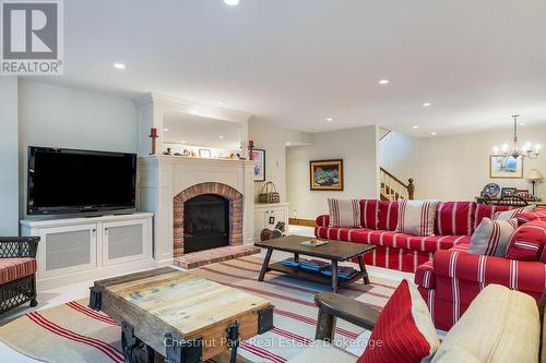 Basement recreation room with gas fireplace - 176 Bartlett Boulevard, Collingwood, ON 