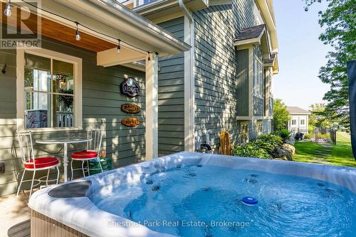 Private outdoor hot tub area off the walkway - 176 Bartlett Boulevard, Collingwood, ON 