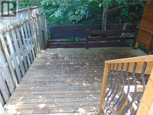 Spacious outdoor wood deck with a privacy fence - 214 Snowdrop Crescent, Kitchener, ON 