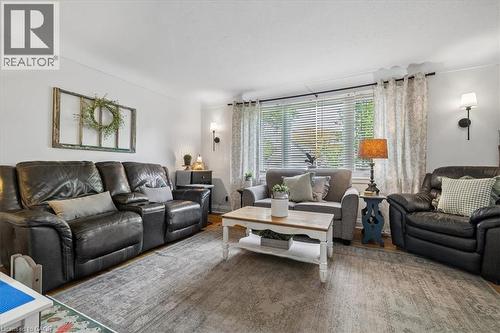 Living area featuring light wood-finish flooring and white walls - 80 Maclennan Avenue, Hamilton, ON - Indoor Photo Showing Living Room