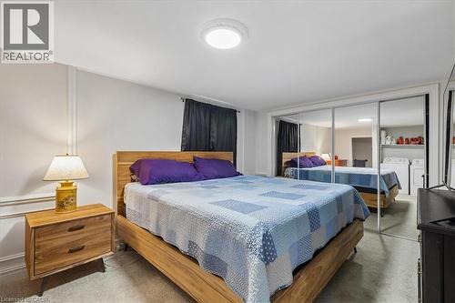Wall-to-wall mirrored closet doors - 80 Maclennan Avenue, Hamilton, ON - Indoor Photo Showing Bedroom