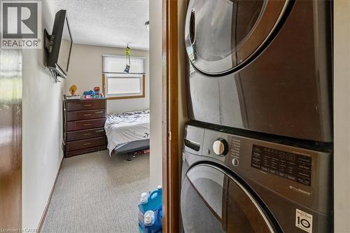 Stackable laundry appliances within a dedicated alcove - 80 Maclennan Avenue, Hamilton, ON 