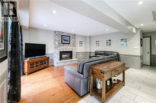 Living room - 29 Woodside Square, Fonthill, ON - Indoor With Fireplace