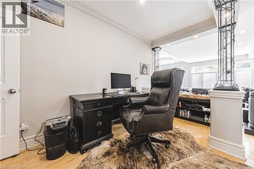 Dedicated office space featuring light wood-finish flooring and crown molding - 712 Highvalley Road, Ancaster, ON 