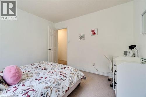 Neutral interior room featuring white walls and light-colored carpeting - 928 Dunblane Court, Kitchener, ON - Indoor Photo Showing Bedroom