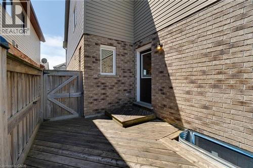 Expansive wood deck with a privacy fence and gate - 928 Dunblane Court, Kitchener, ON - Outdoor With Exterior