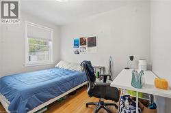 White-painted interior walls with wood-finish flooring - 