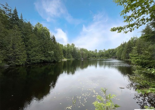 Vue sur l'eau - 612 Ch. Du Lac-Corbeau, Morin-Heights, QC - Outdoor With Body Of Water With View