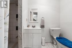 Basement bathroom with stand up shower - 
