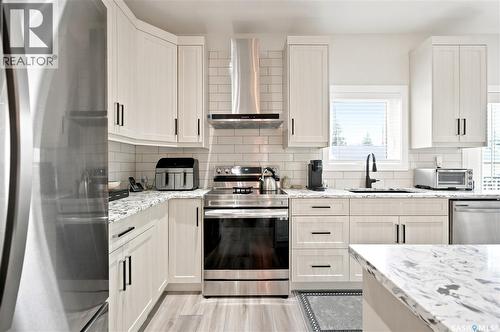414A 109Th Street W, Saskatoon, SK - Indoor Photo Showing Kitchen With Stainless Steel Kitchen With Upgraded Kitchen
