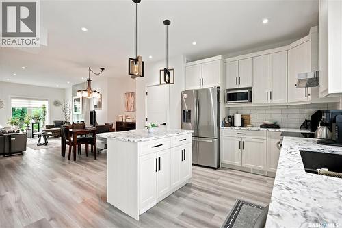 414A 109Th Street W, Saskatoon, SK - Indoor Photo Showing Kitchen With Stainless Steel Kitchen With Upgraded Kitchen