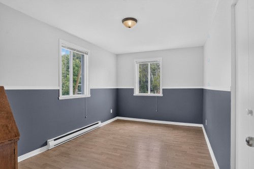 Chambre à coucher - 157 128E Avenue, Saint-Hippolyte, QC - Indoor Photo Showing Other Room
