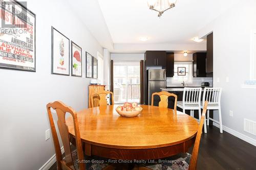 Dining Room and Kitchen Island - 11 John Russell Lane, Kitchener, ON 