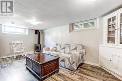 Lower family room with gas fireplace - 