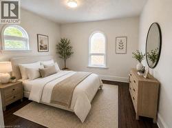 Hardwood-style flooring complemented by light-toned wall finishes - 