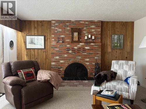 2400 Arnoldus Road, Quesnel, BC - Indoor Photo Showing Living Room With Fireplace