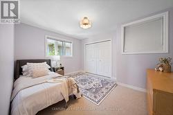 Second upper bedroom,  double closet and storage n - 