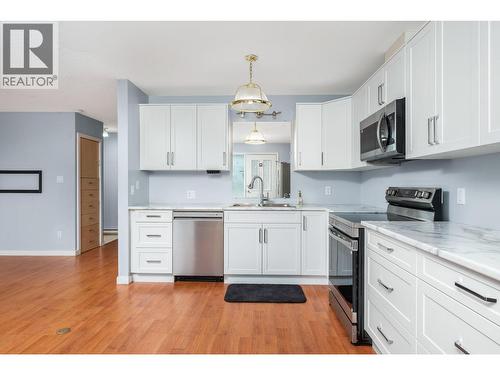 From the front entrance - 5008 Heritage Drive, Vernon, BC - Indoor Photo Showing Kitchen
