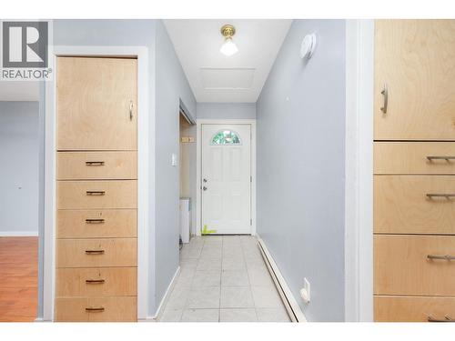 Cute original storage - 5008 Heritage Drive, Vernon, BC - Indoor Photo Showing Other Room