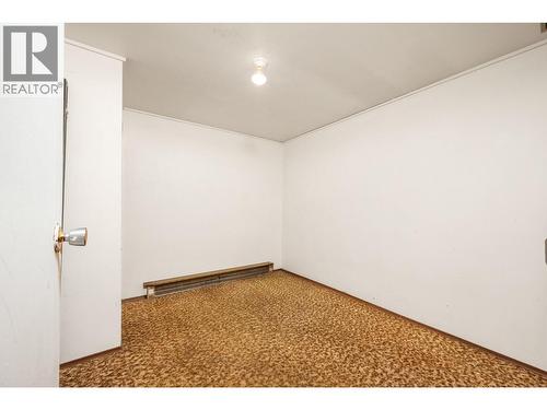 Back storage room 1 in basement - 5008 Heritage Drive, Vernon, BC - Indoor Photo Showing Other Room