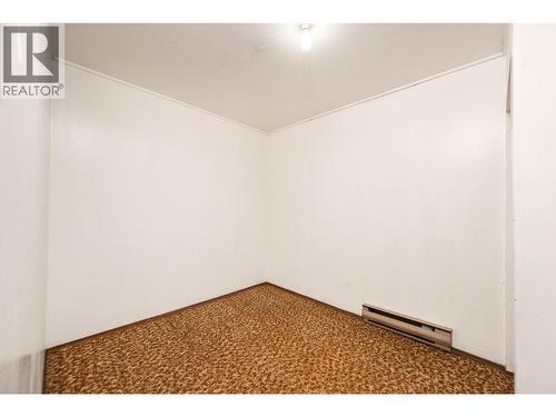 Back storage room 2 in basement - 5008 Heritage Drive, Vernon, BC - Indoor Photo Showing Other Room