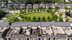 Rooftop terraces featuring various outdoor living spaces and pavers - 