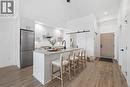 Virtual staging of kitchen - 660 Cawston Avenue Unit# 111, Kelowna, BC 