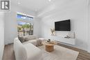 Virtual staging of living room - 660 Cawston Avenue Unit# 111, Kelowna, BC 