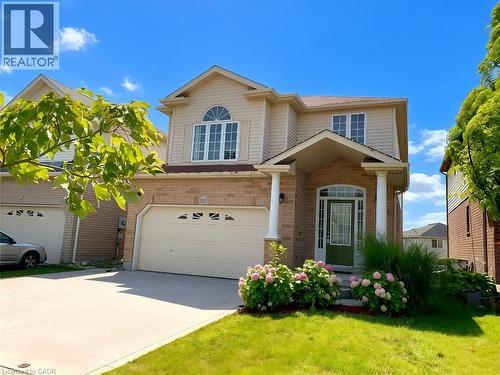 Two-story residence featuring a brick and siding exterior - 389 Tealby Crescent Unit# Lower, Waterloo, ON 