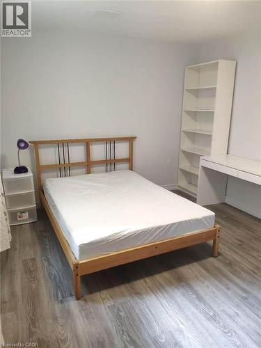 Neutral wall color, wood-finish flooring, and a recessed ceiling light - 389 Tealby Crescent Unit# Lower, Waterloo, ON 