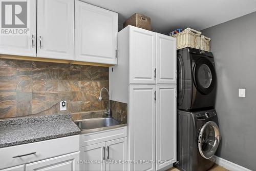 Main floor laundry w direct access to the garage - 1229 Morton Line, Cavan Monaghan (Cavan Twp), ON 