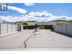Entrance to 6450 Okanagan Landing Rd. - The Breeze - 