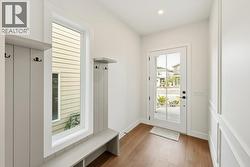 Foyer/front entrance with built-ins - 